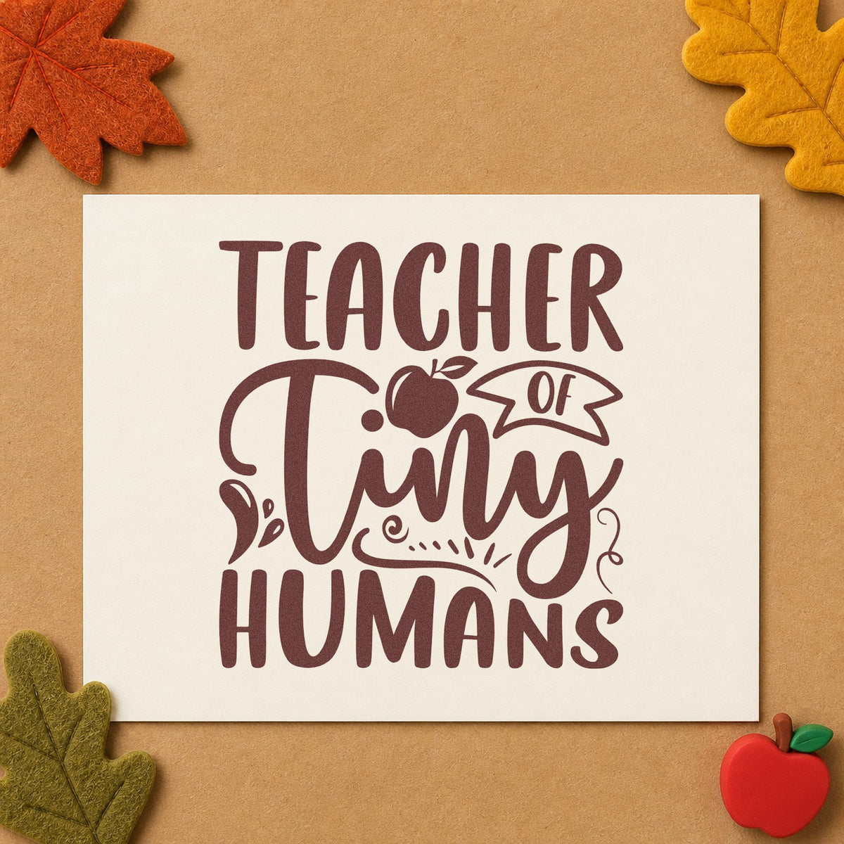 Teacher Of Tiny Humans Apple rubber stamp printed in brown ink, ready for bottle rack labels and similar paper crafts.