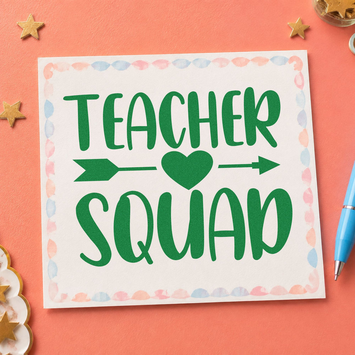 Teacher Squad Heart Arrow craft stamp imprint in green ink on a handmade project, one idea being joint plan pages.
