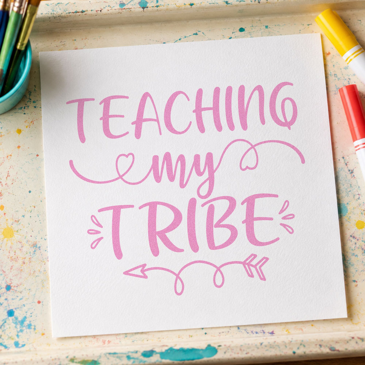 Teaching My Tribe Flourishes craft stamp in purple ink on cardstock, an easy option for merit token tags.