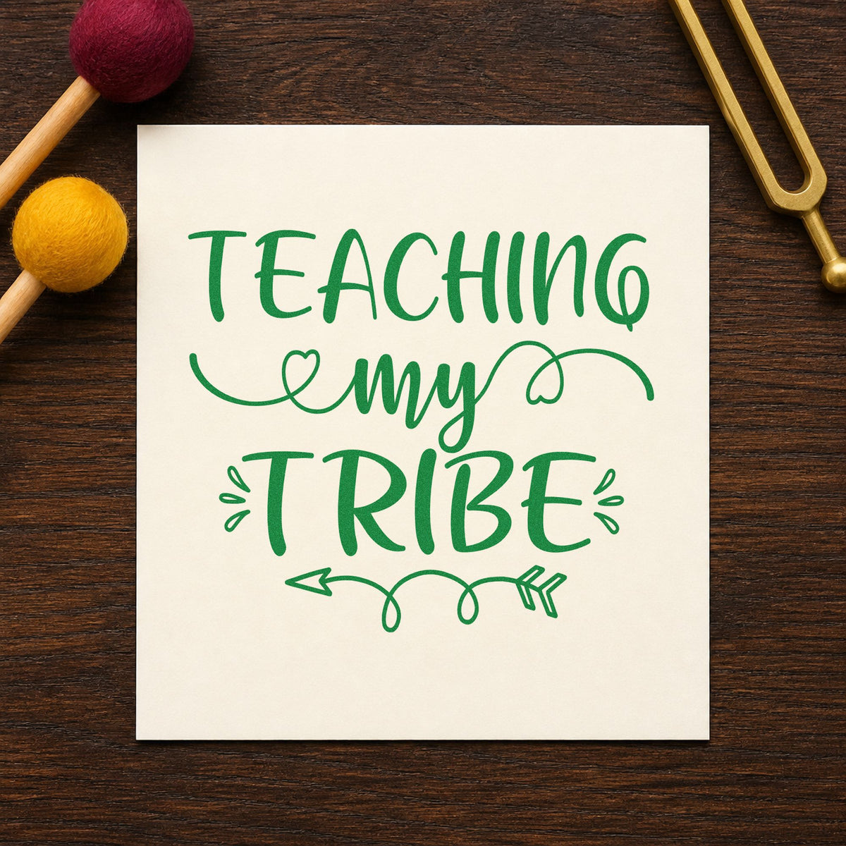 Teaching My Tribe Flourishes craft stamp imprint in green ink on a handmade project, one idea being framed house board.