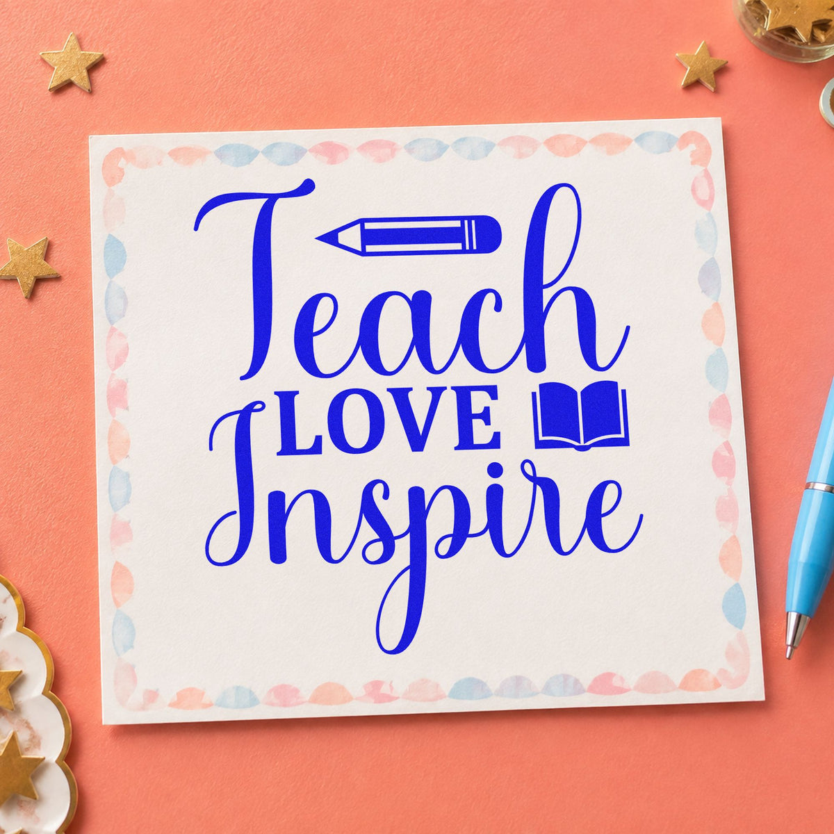Teach Love Inspire Book craft stamp in blue ink on cardstock, an easy option for book bag panels.