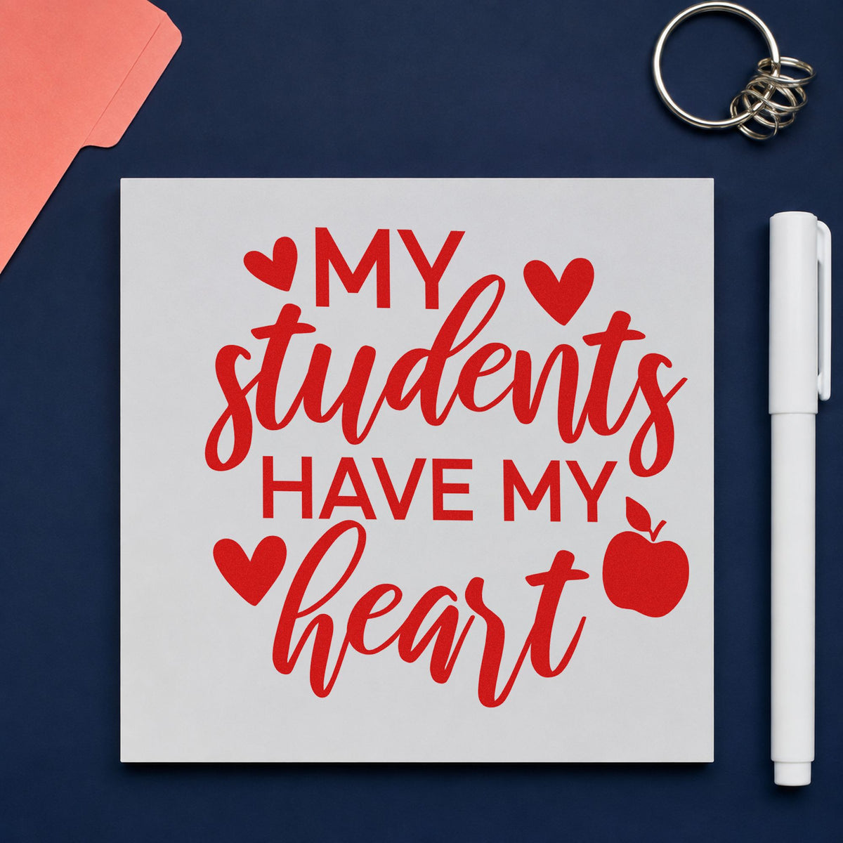 Students Have My Heart Apple rubber stamp shown in red ink, stamped for projects such as final term notes.