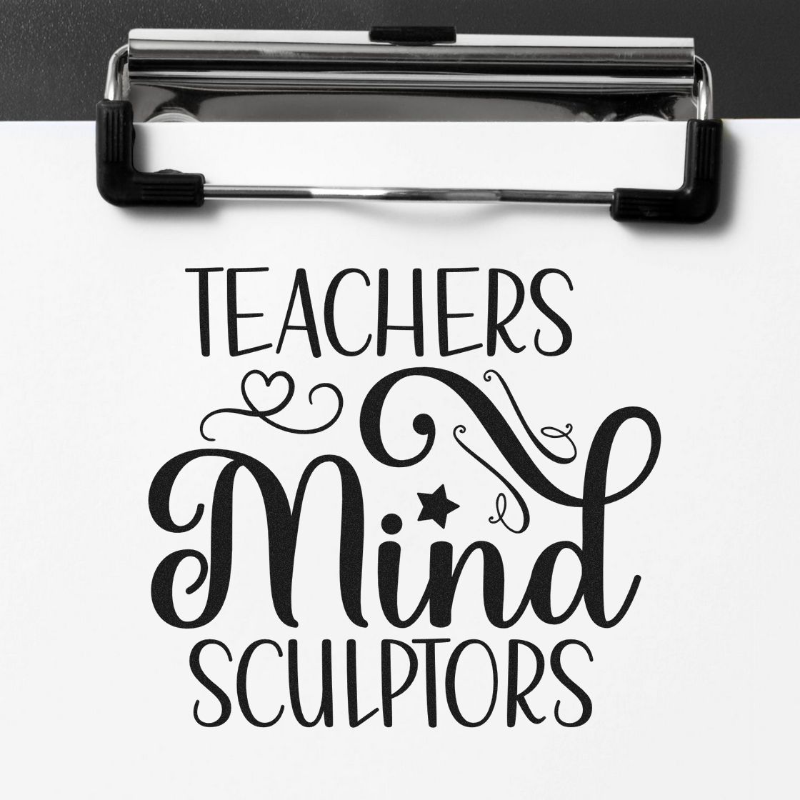 Teacher rubber stamp imprint reading "Teachers Mind Sculptors" for classroom papers, cards, and educator gifts.