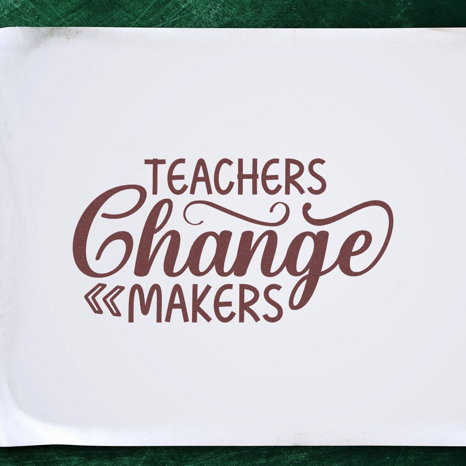 Teachers Change Makers rubber stamp impression on white paper, ideal for educator appreciation crafts and classroom stationery.