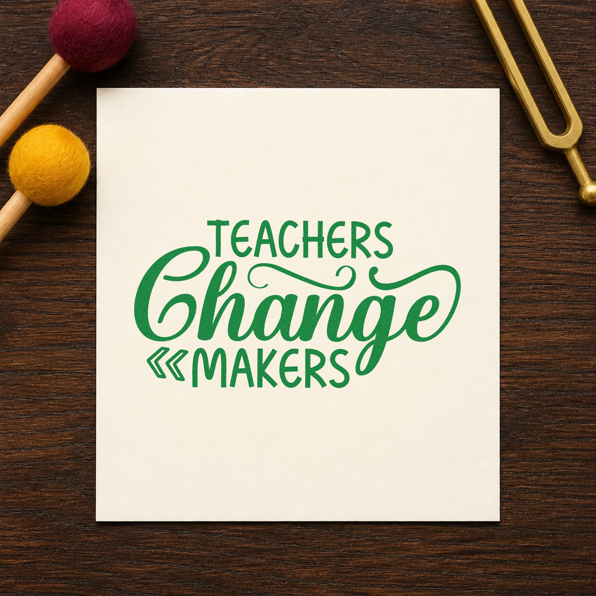 Teachers Change Makers craft stamp imprint in green ink on a handmade project, one idea being proposal form pages.