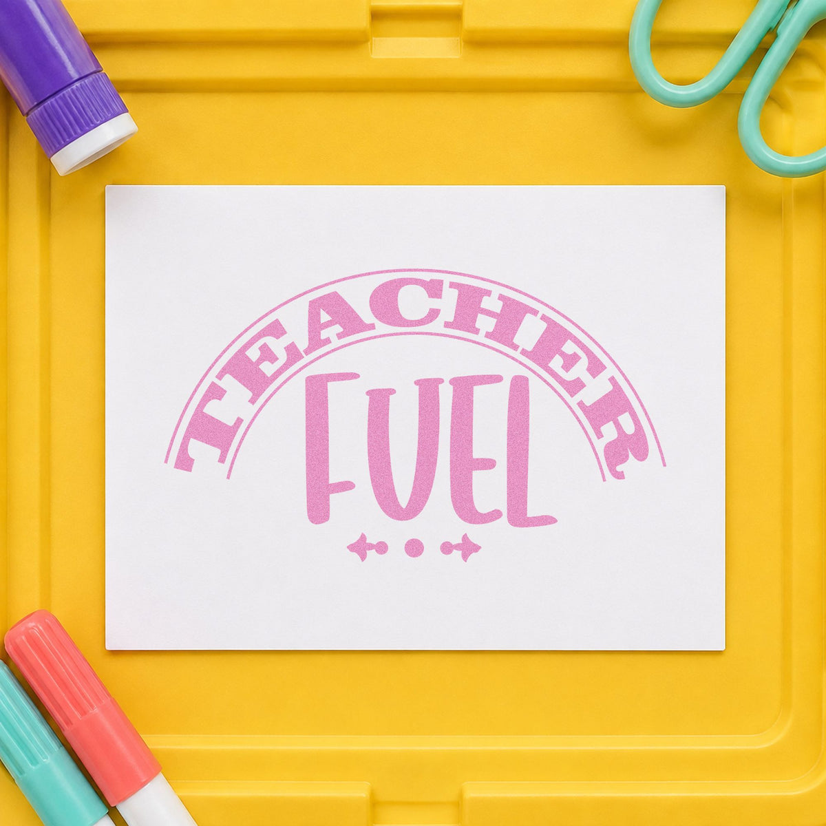 Teacher Fuel Arched Badge craft stamp in purple ink on cardstock, an easy option for basket item tags.