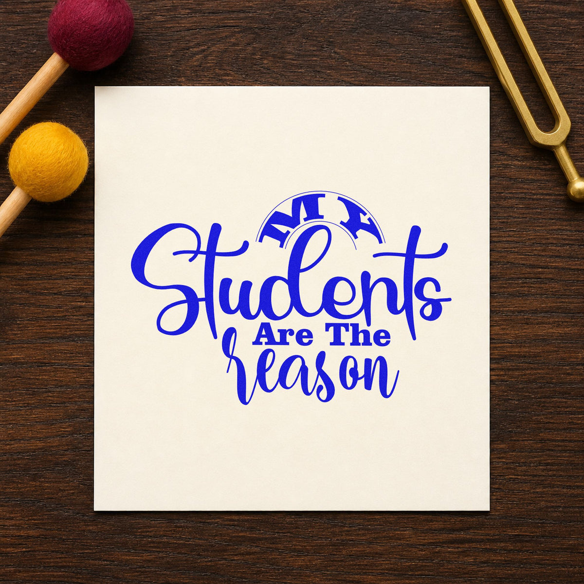 My Students Are The Reason craft stamp in blue ink on cardstock, an easy option for table cloth panels.