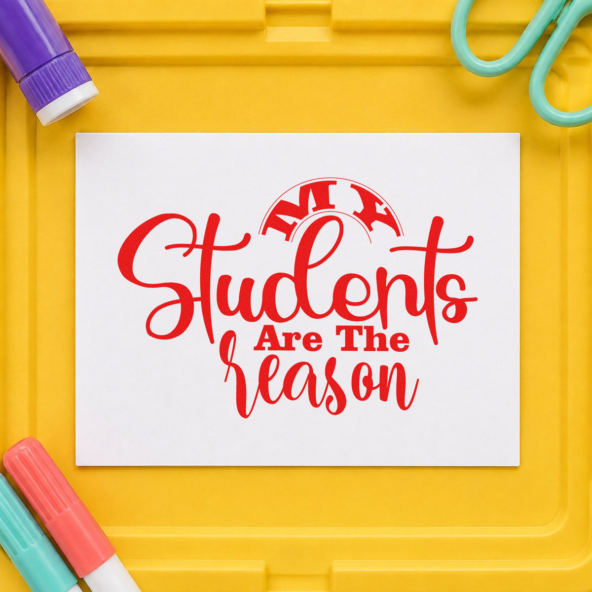 My Students Are The Reason rubber stamp shown in red ink, stamped for projects such as reception day notes.
