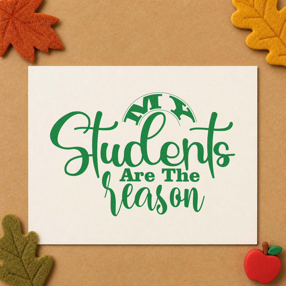 My Students Are The Reason craft stamp imprint in green ink on a handmade project, one idea being framed top table.