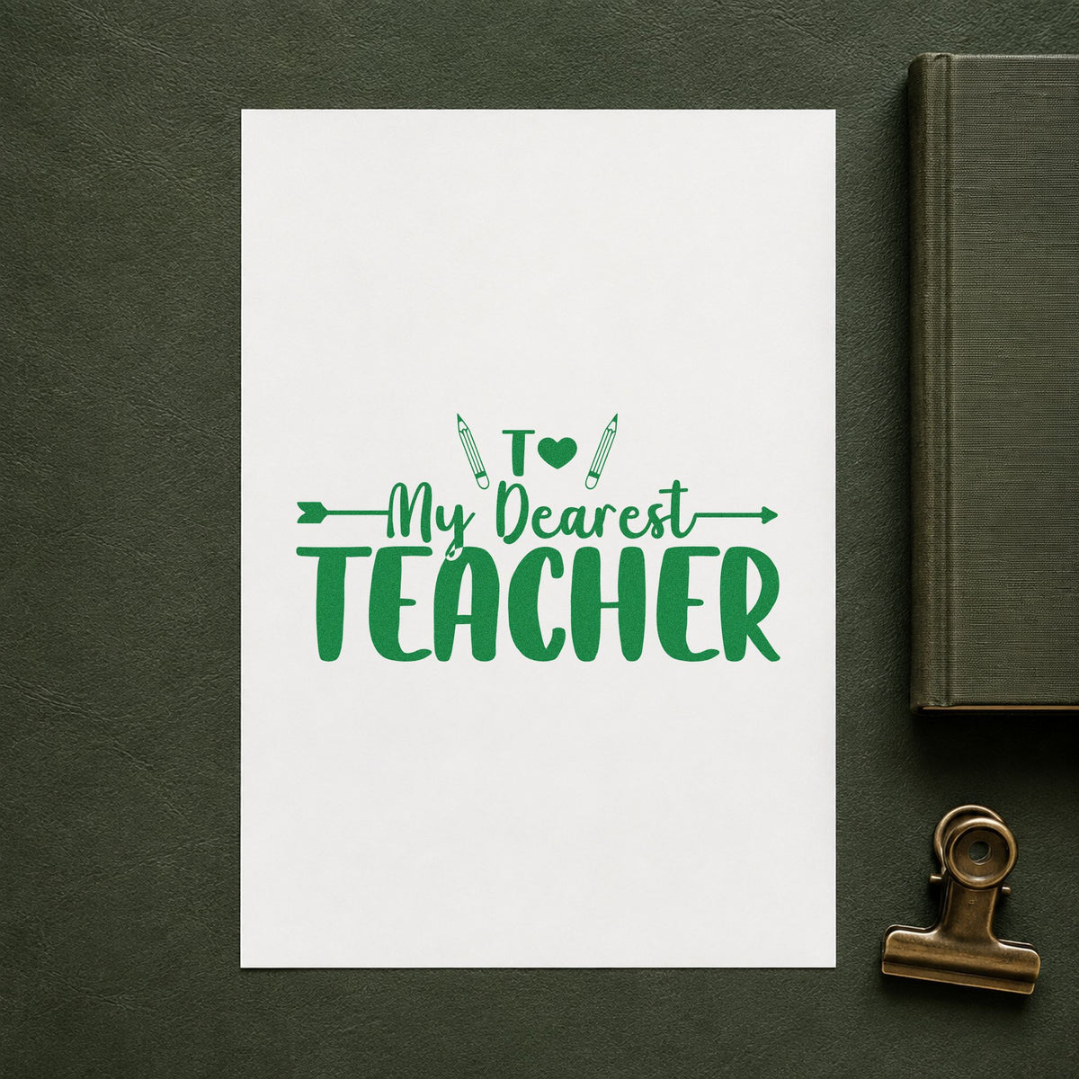My Dearest Teacher craft stamp imprint in green ink on a handmade project, one idea being notepaper pages.