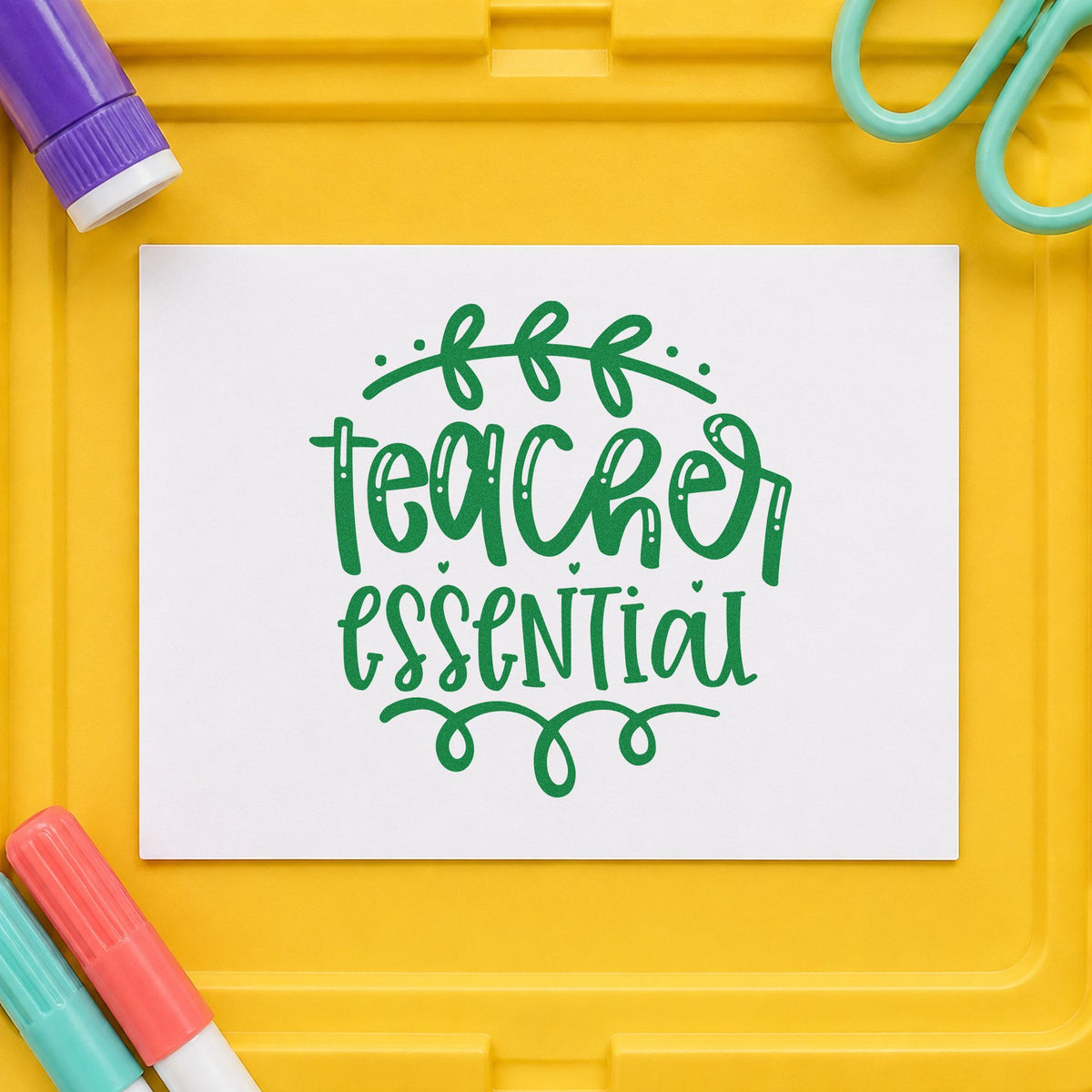 Teacher Essential Leafy Flourish craft stamp imprint in green ink on a handmade project, one idea being packing list pages.