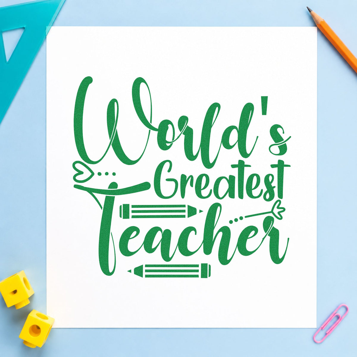World's Greatest Teacher Pencils craft stamp imprint in green ink on a handmade project, one idea being framed trophy case.