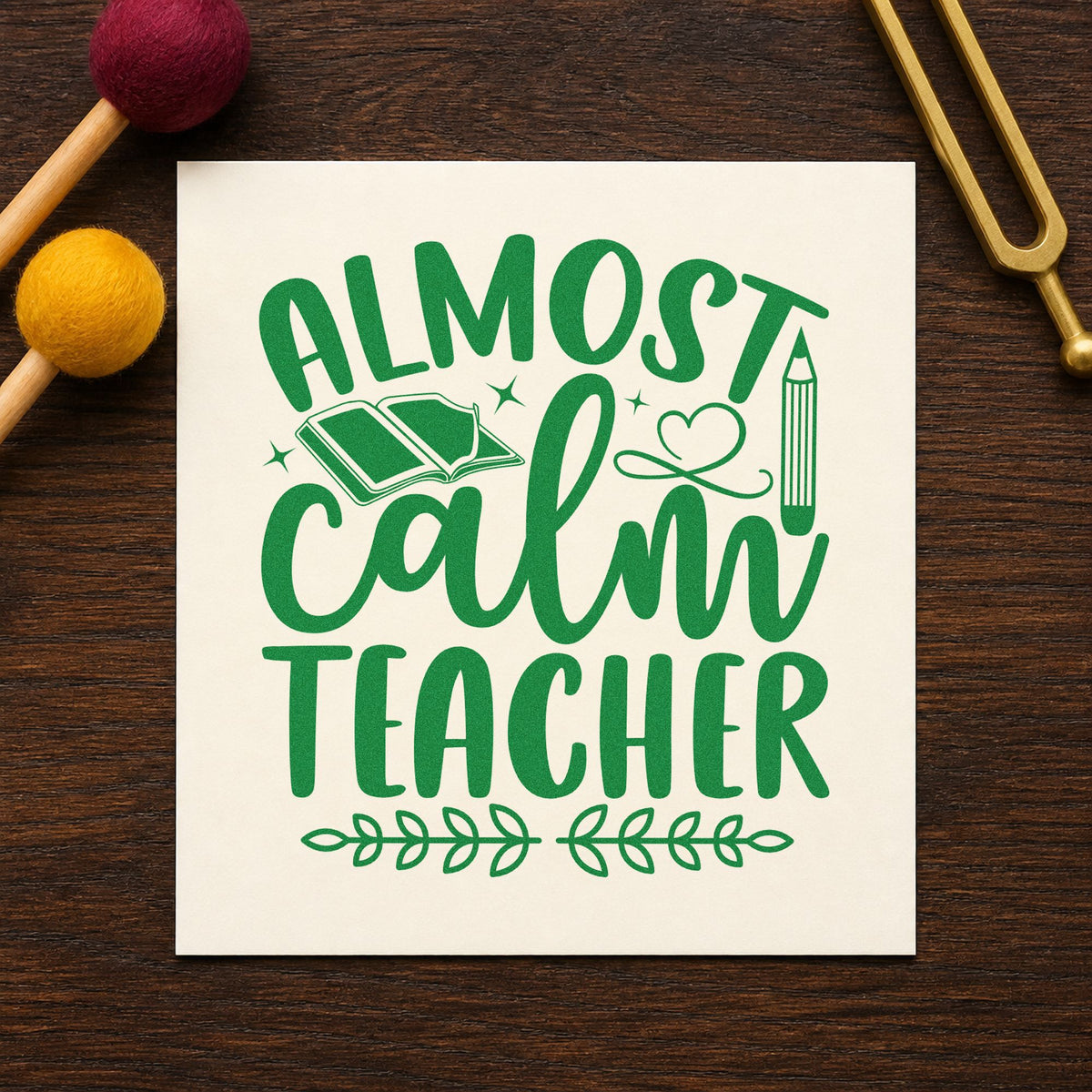 Almost Calm Teacher craft stamp imprint in green ink on a handmade project, one idea being framed quiet nook.