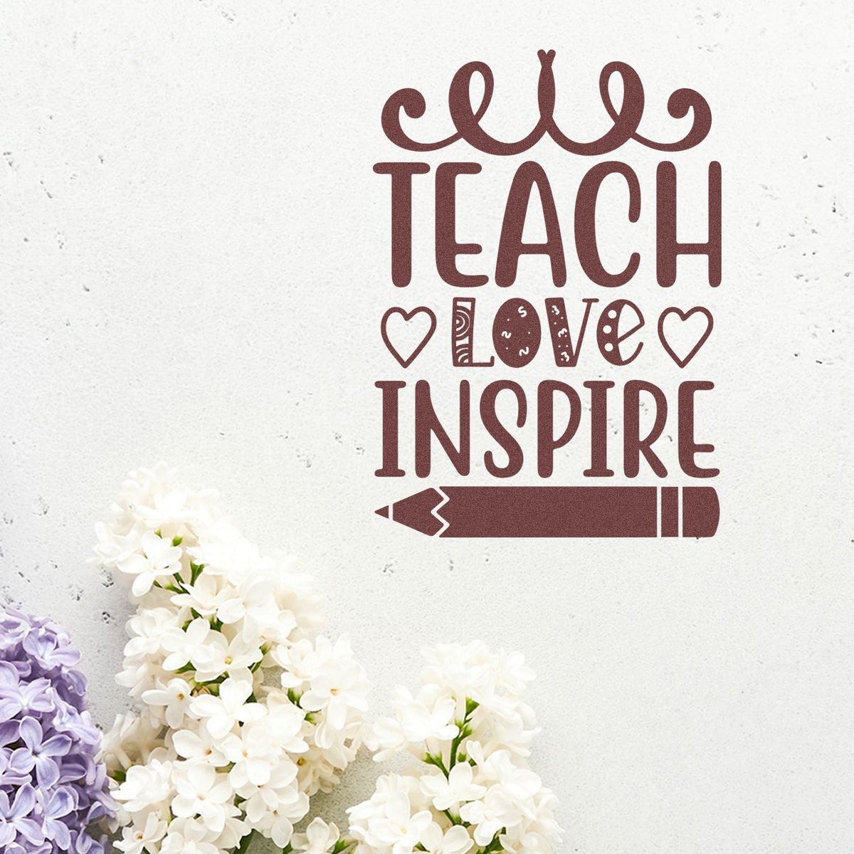 Teach Love Inspire Hearts Pencil rubber stamp shown in brown ink, stamped for projects such as baby shower tags.