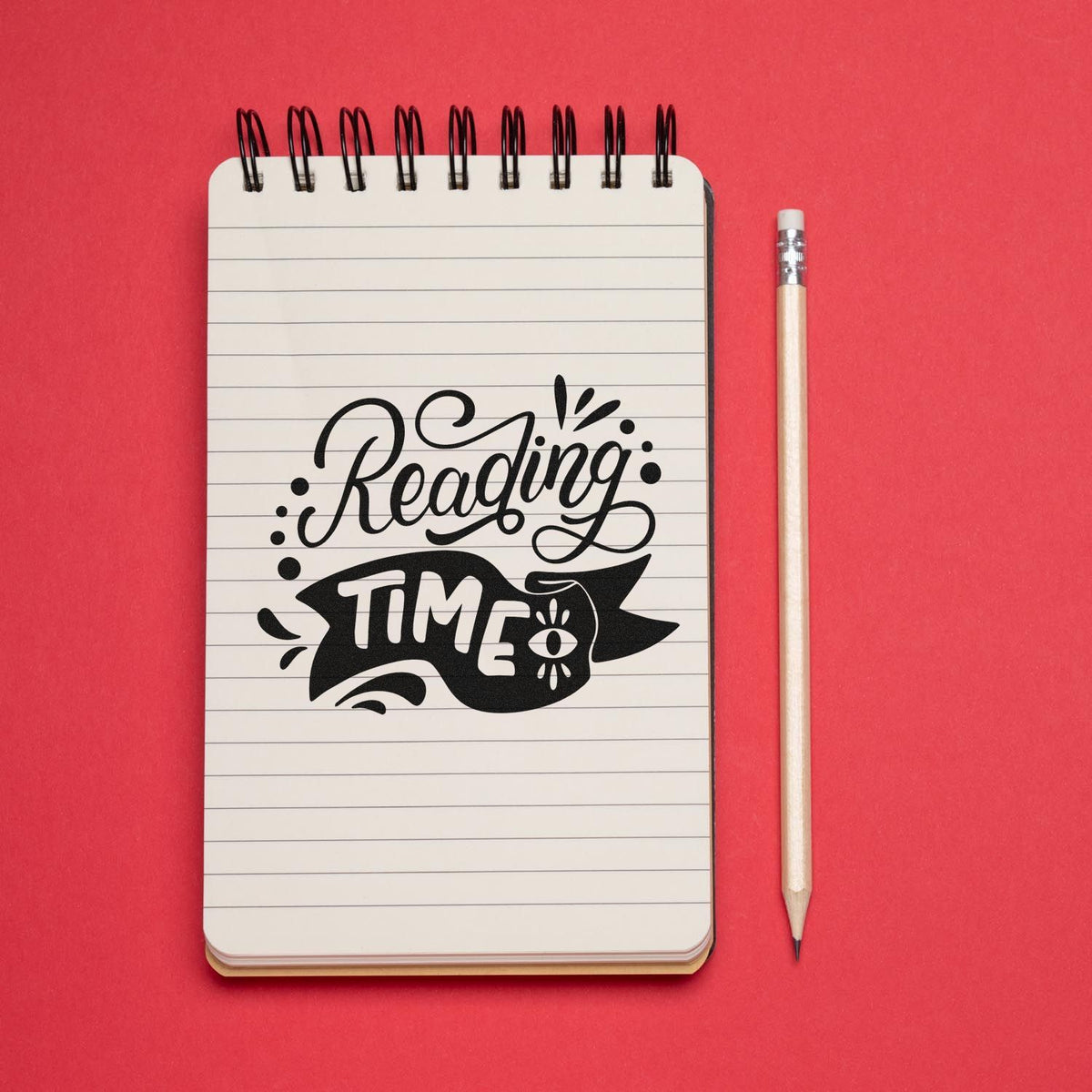 Reading Time Eye And Banner Stamp - Premium Vintage Pro Wooden imprint stamped in black ink. Script "Reading" sits above a dark "Time" banner with an eye motif and small ornamental accents.