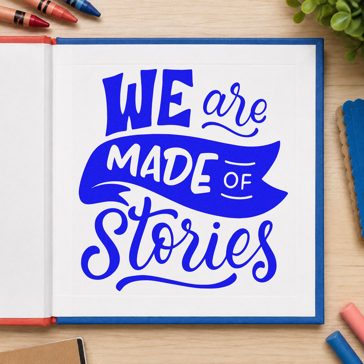 We Are Made Of Stories craft stamp imprinted in blue ink on paper, a design suited to consent form seals.