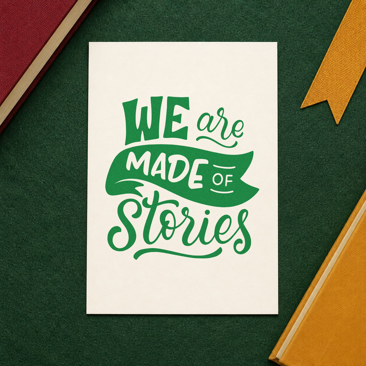 We Are Made Of Stories craft stamp imprint in green ink on a handmade project, one idea being framed story corner.