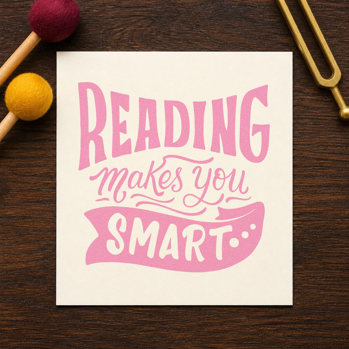 Reading Makes You Smart craft stamp in purple ink on cardstock, an easy option for challenge tags.