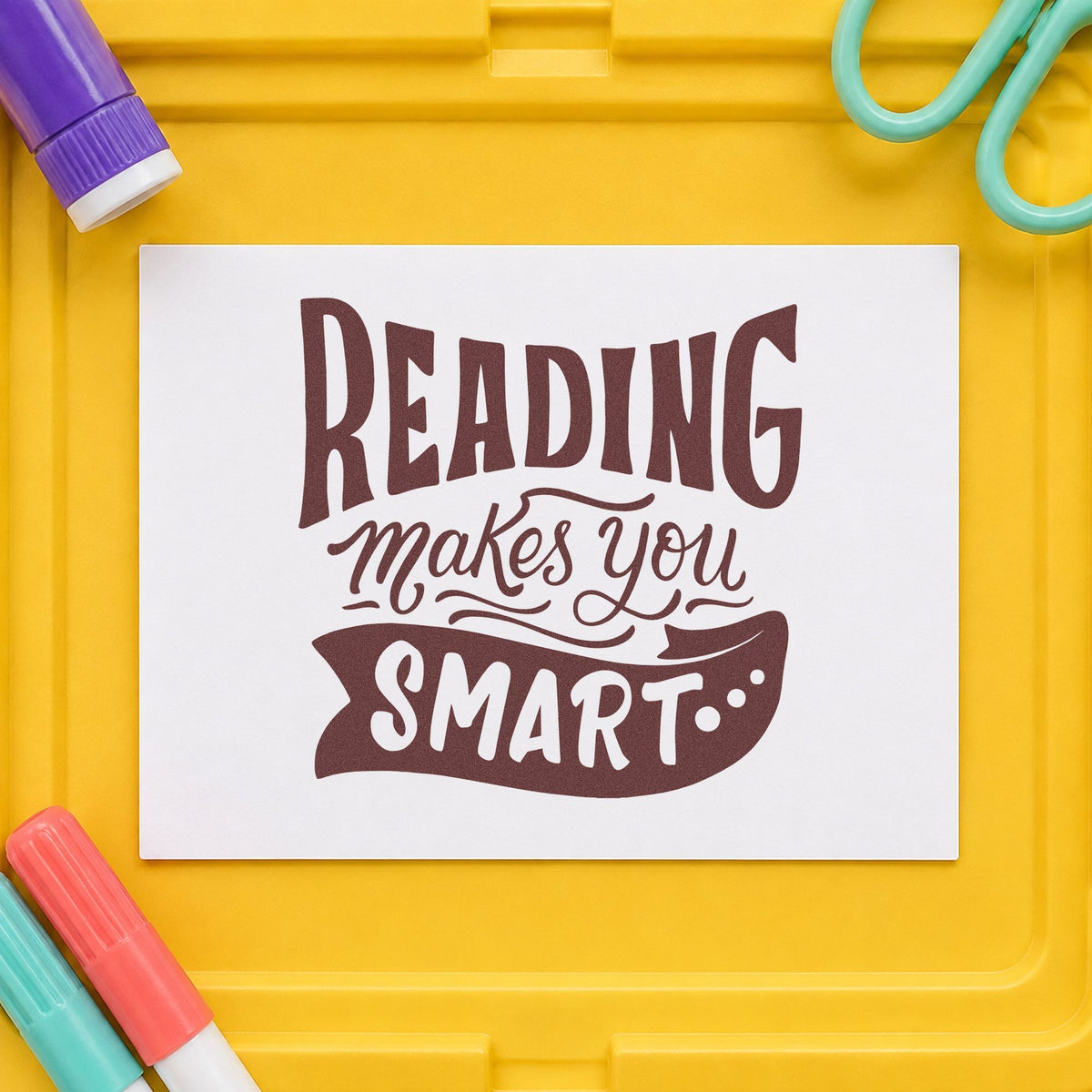 Reading Makes You Smart rubber stamp printed in brown ink, ready for prize shelf labels and similar paper crafts.