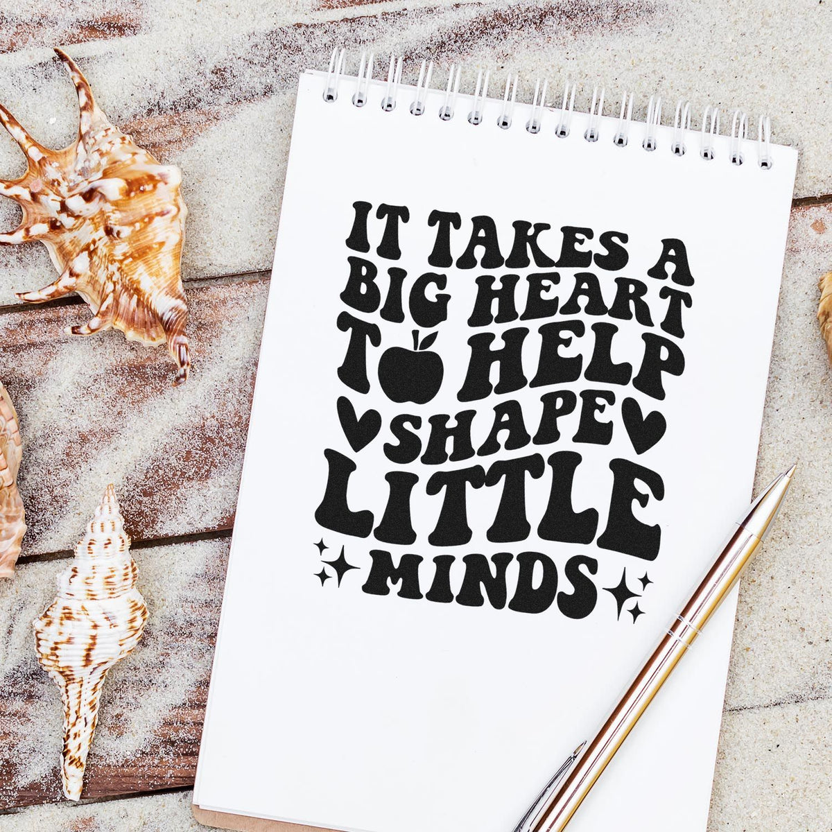 It Takes A Big Heart To Help Shape Little Minds Premium Wooden Stamp - Vintage Pro imprint stamped in black ink. "It Takes a Big Heart to Help Shape Little Minds" appears with an apple, hearts, and sparkles.