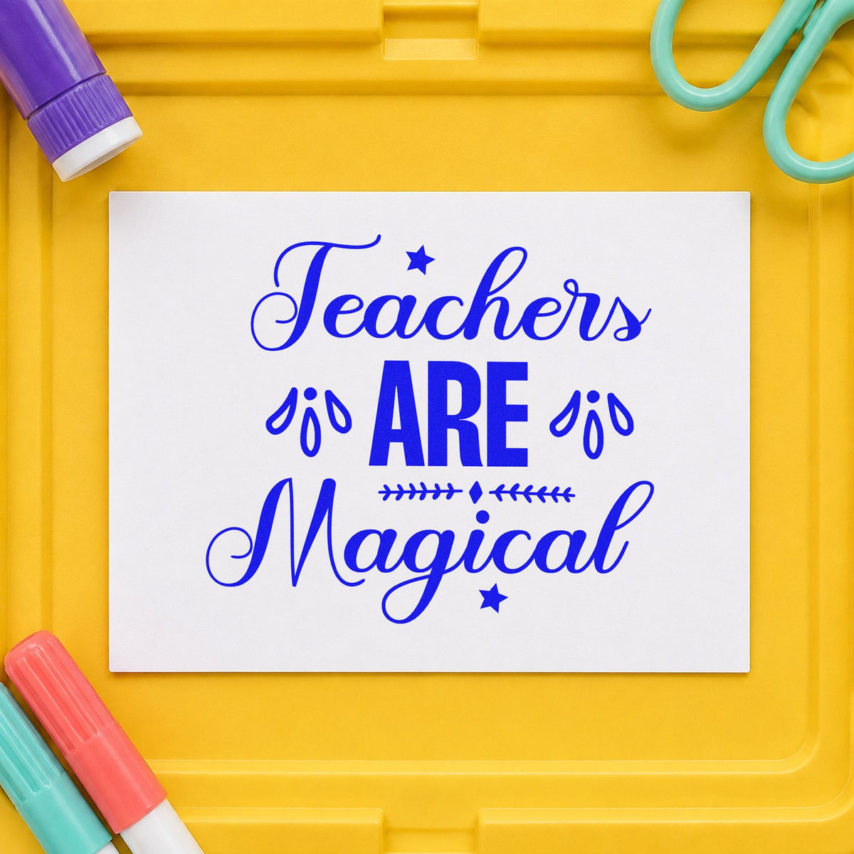 Teachers Are Magical craft stamp imprinted in blue ink on paper, a design suited to invite scroll seals.