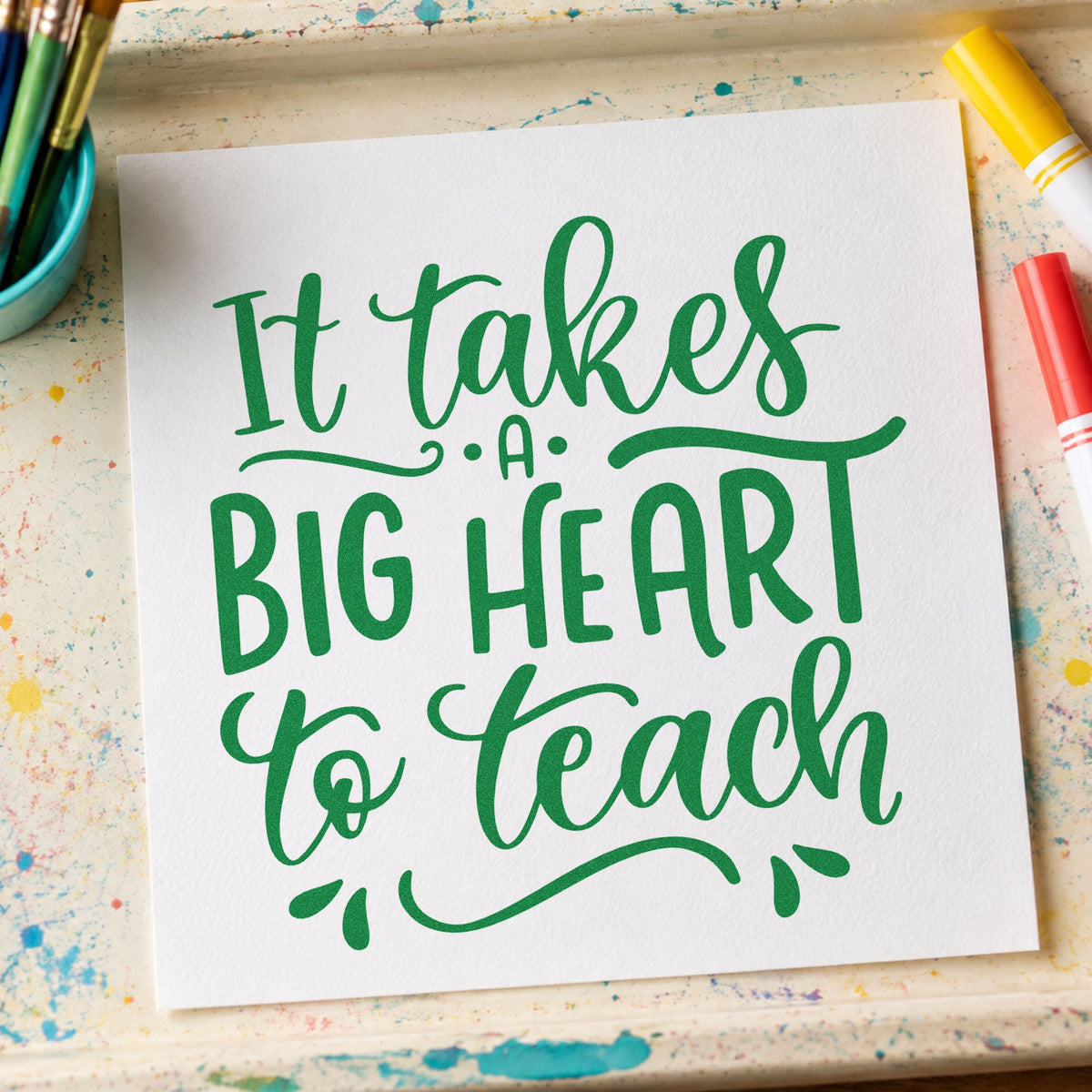 Big Heart To Teach craft stamp imprint in green ink on a handmade project, one idea being framed honour wall.