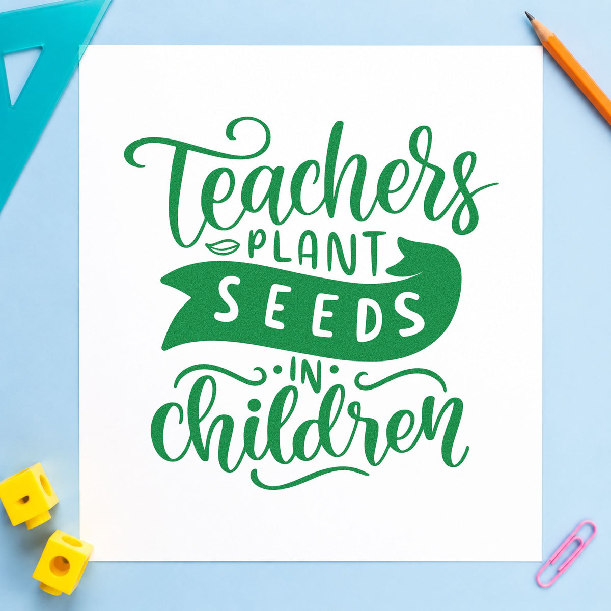 Teachers Plant Seeds In Children craft stamp imprint in green ink on a handmade project, one idea being sprout diary pages.