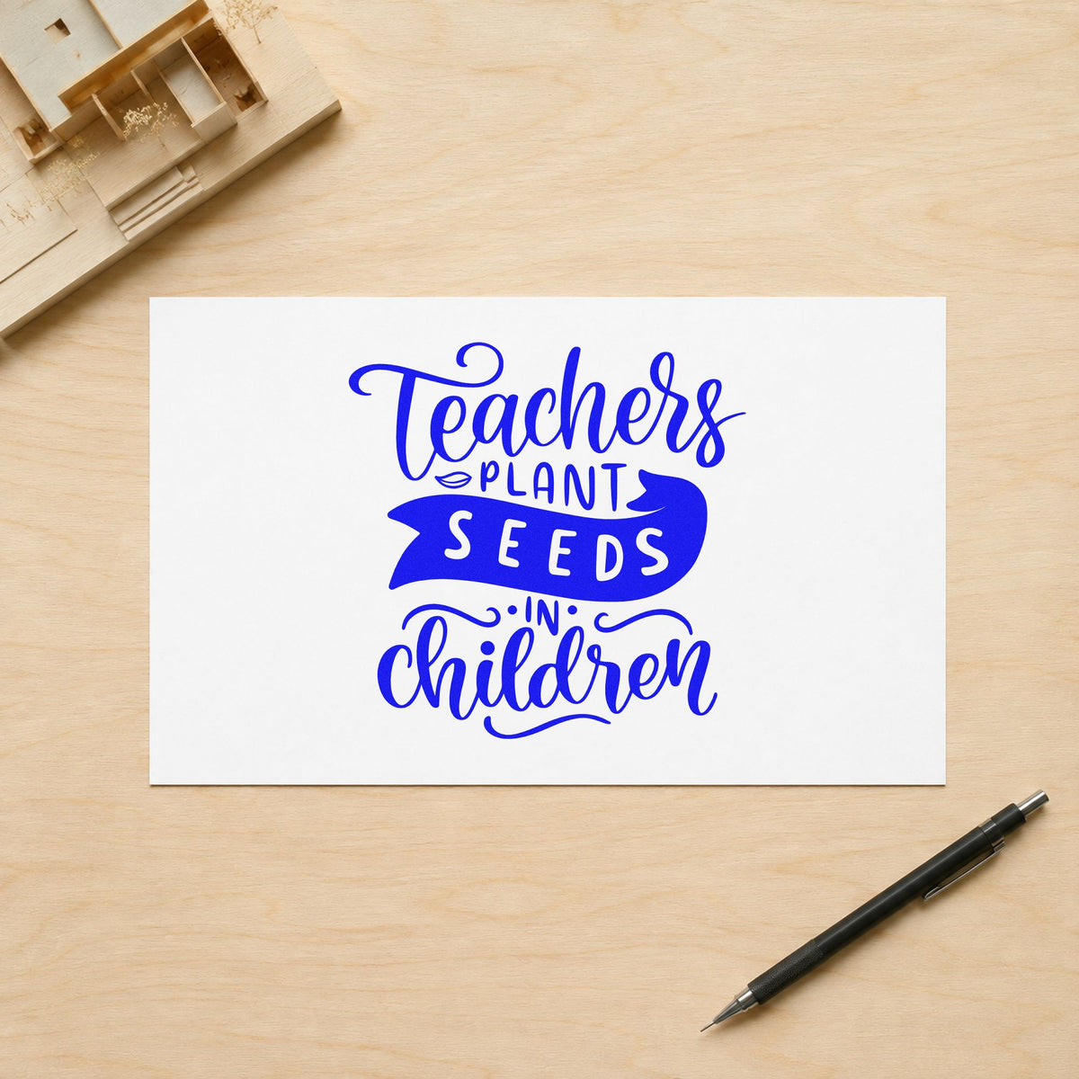 Teachers Plant Seeds In Children craft stamp in blue ink on cardstock, an easy option for watering can panels.