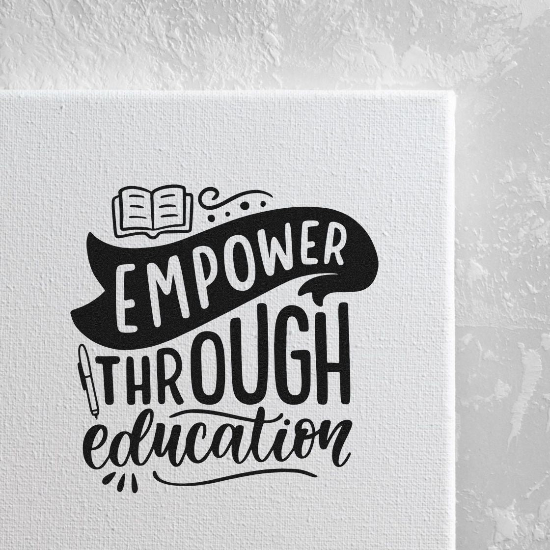 Motivational education rubber stamp design with book and pen icons and the phrase Empower Through Education.