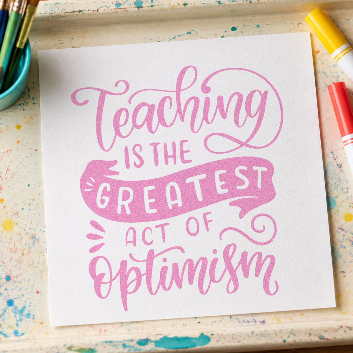 Teaching Greatest Act Of Optimism craft stamp in purple ink on cardstock, an easy option for new year tags.