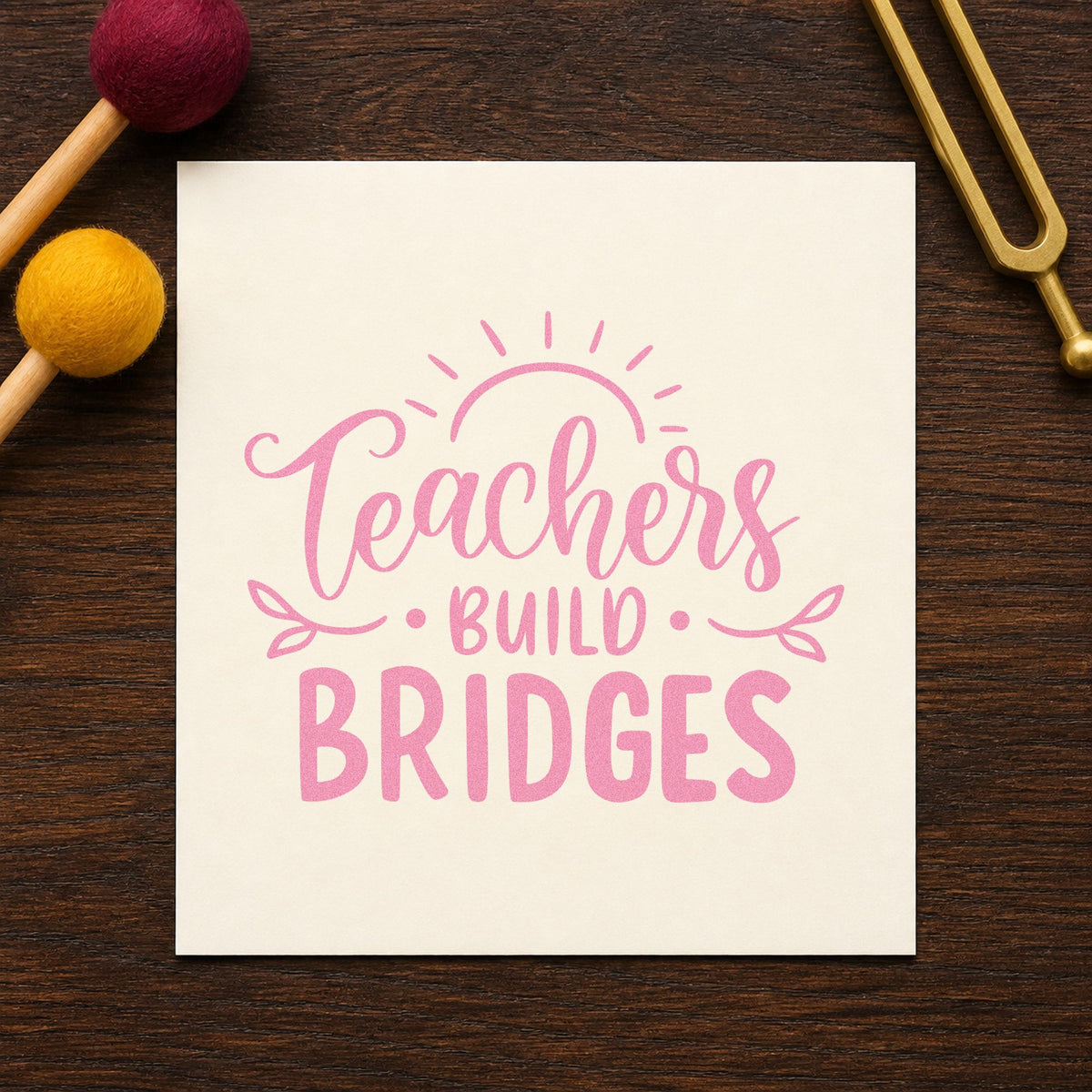 Teachers Build Bridges craft stamp in purple ink on cardstock, an easy option for move up tags.
