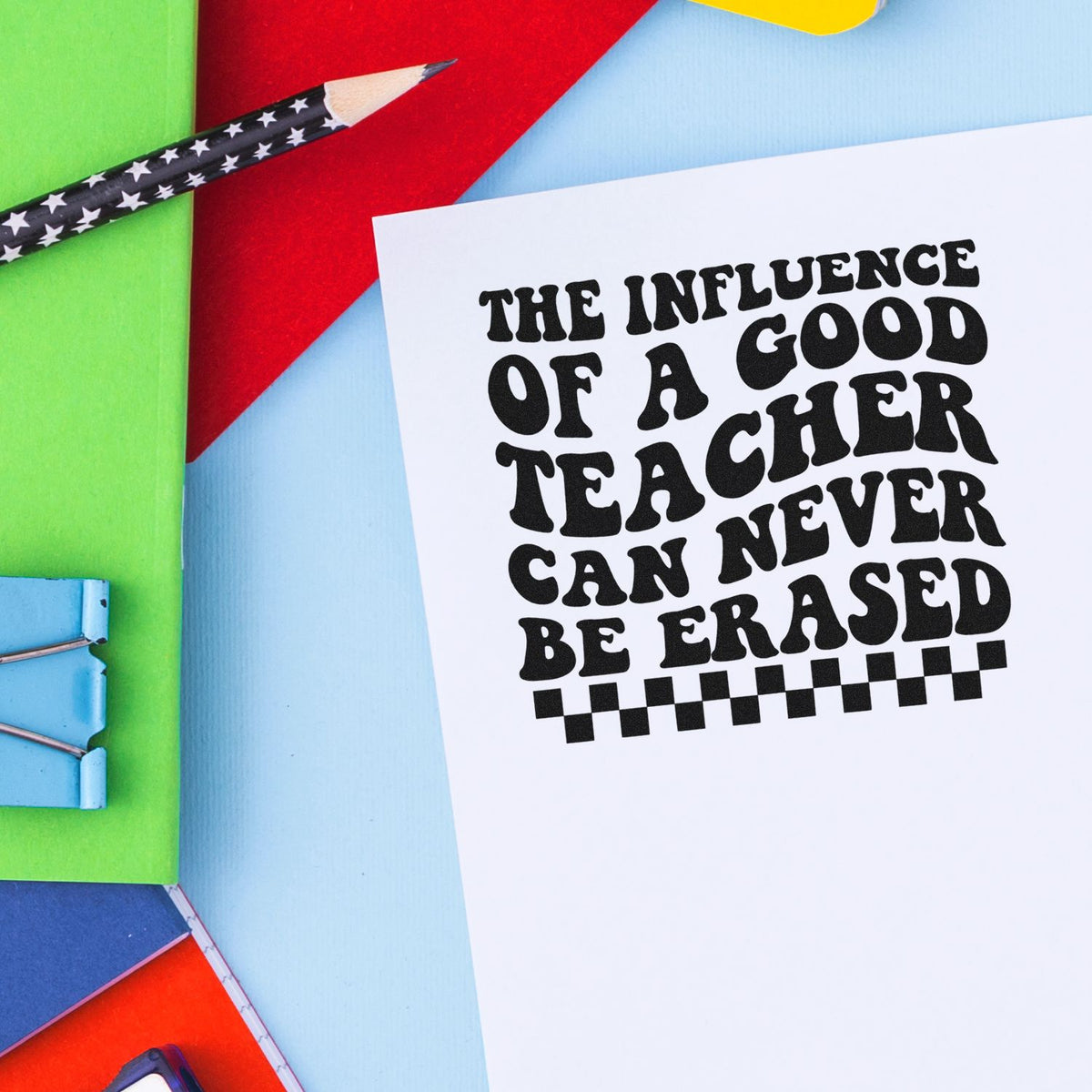 Vintage Pro Good Teacher Lasting Influence Checkers Premium Wooden Stamp imprint stamped in black ink. "The Influence of a Good Teacher Can Never Be Erased" appears above a checkerboard strip.