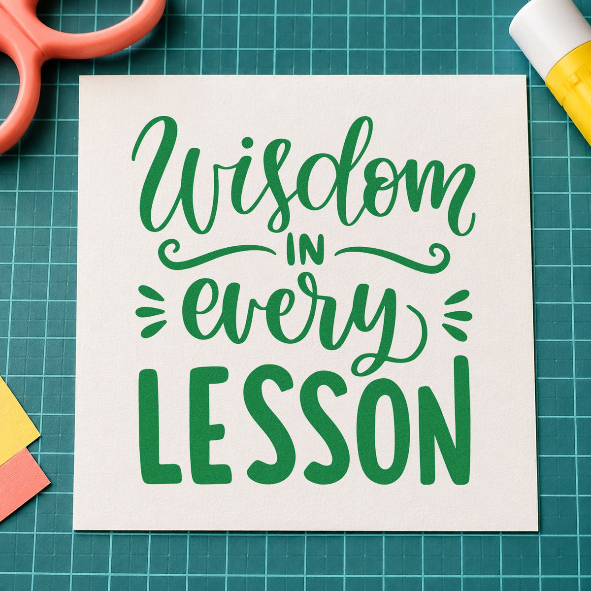 Wisdom In Every Lesson craft stamp imprint in green ink on a handmade project, one idea being lesson plan pages.