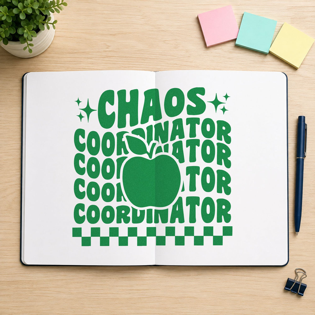 Chaos Coordinator Apple Repeat craft stamp imprint in green ink on a handmade project, one idea being framed office check.