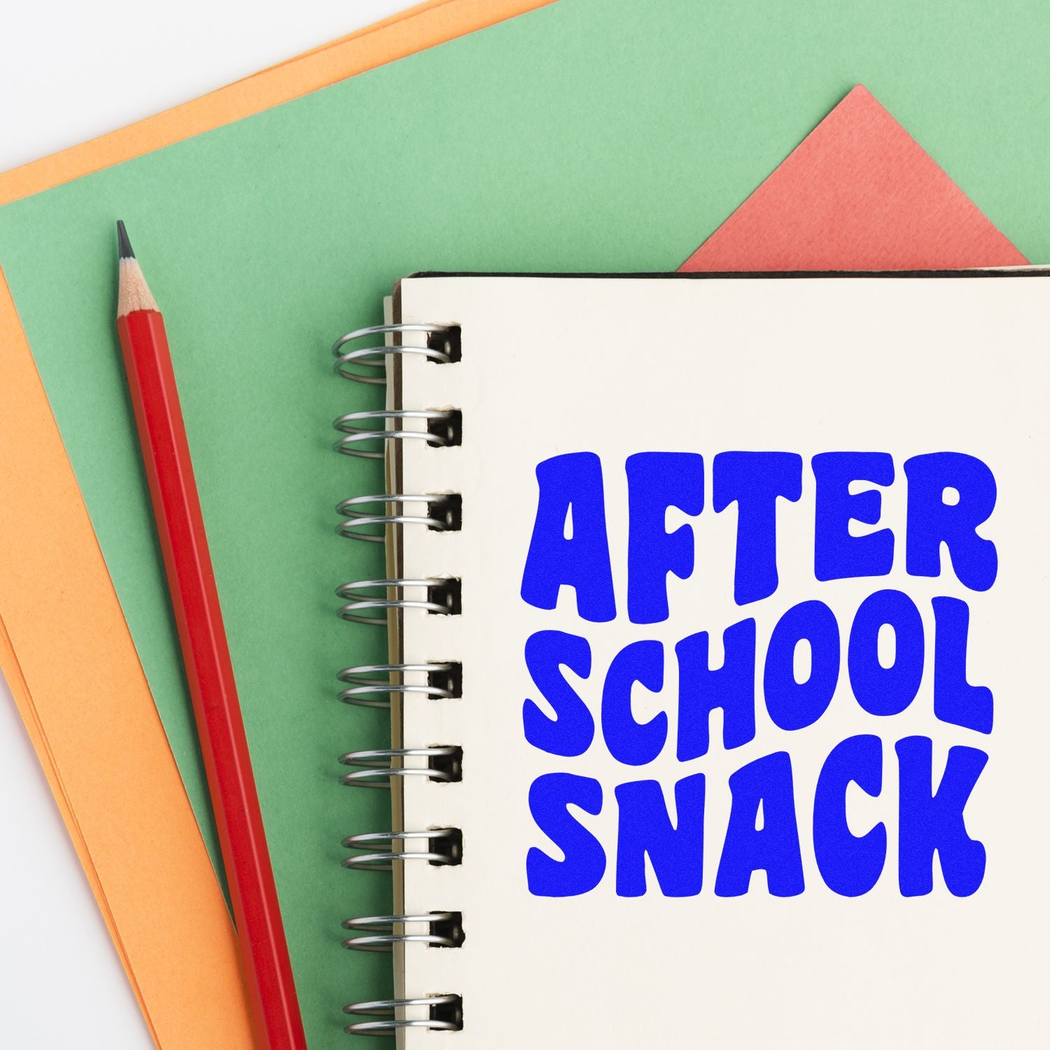After School Snack rubber stamp design on a notebook, perfect for school crafts, planners, and kids labels.