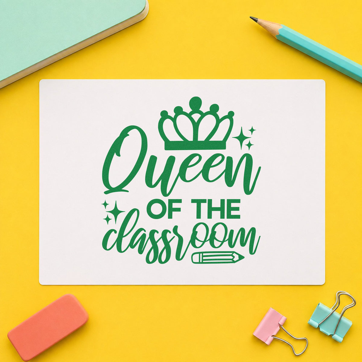 Queen Of The Classroom Crown craft stamp imprint in green ink on a handmade project, one idea being seating chart pages.