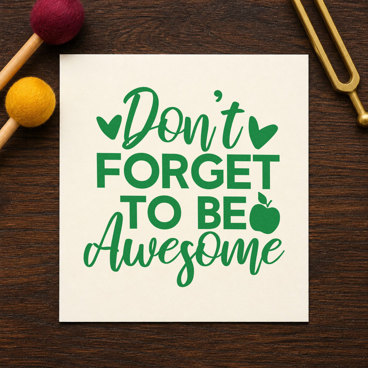 Don't Forget To Be Awesome craft stamp imprint in green ink on a handmade project, one idea being framed stair wall.