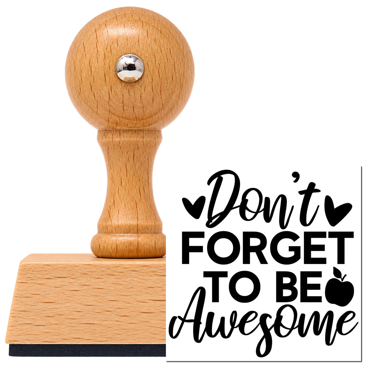 Don't Forget To Be Awesome Vintage Pro rubber stamp in European beech wood with a round knob handle, shown beside its black imprint.