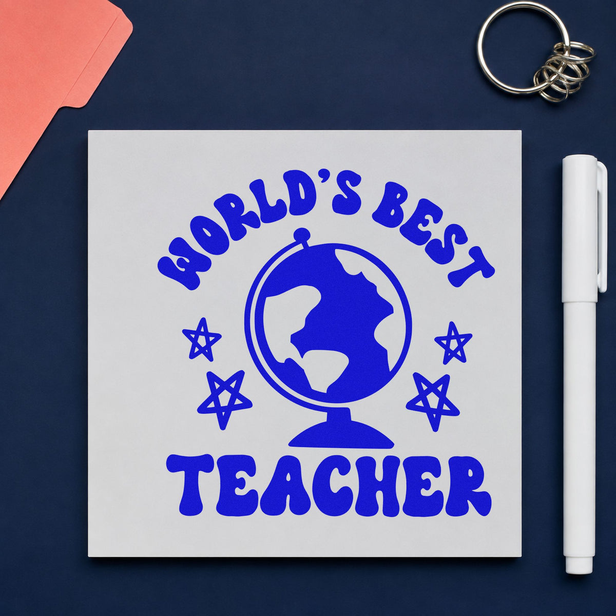 World's Best Teacher Globe craft stamp imprinted in blue ink on paper, a design suited to observing seals.