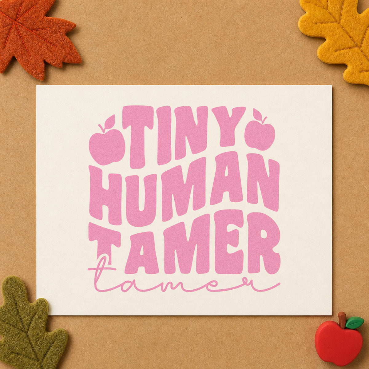 Tiny Human Tamer Apples craft stamp in purple ink on cardstock, an easy option for party host tags.