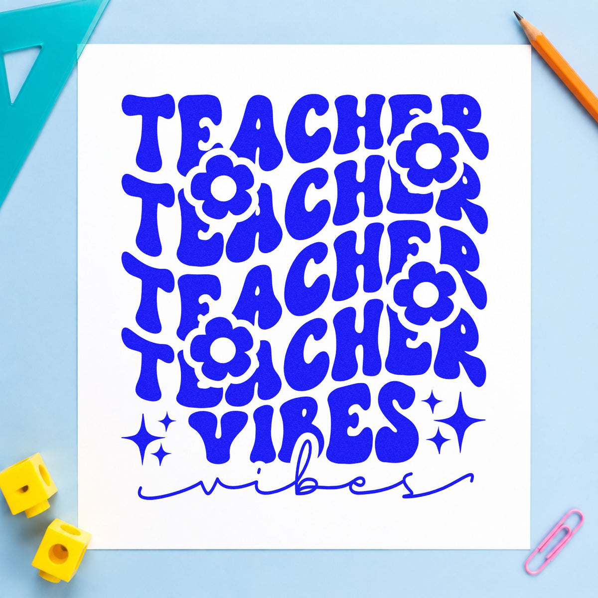 Teacher Vibes Repeated Flowers craft stamp in blue ink on cardstock, an easy option for linen trim panels.
