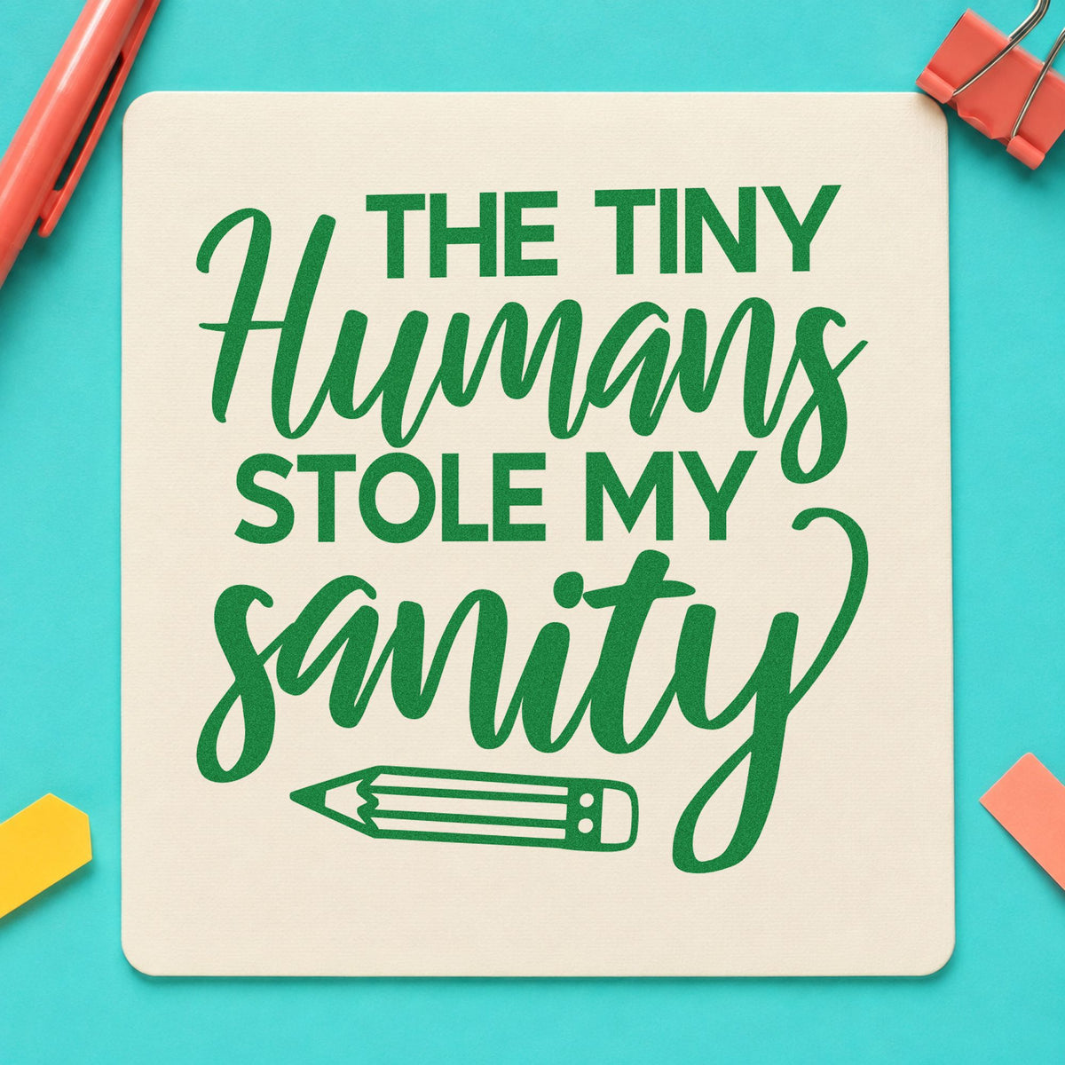 Tiny Humans Stole Sanity craft stamp imprint in green ink on a handmade project, one idea being framed staff hideout.