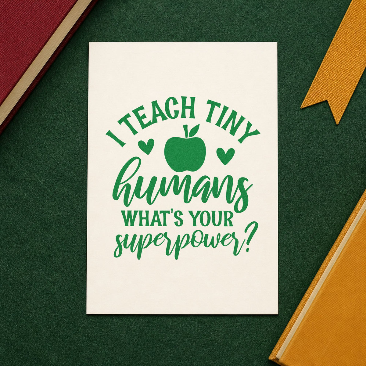Teach Tiny Humans Superpower craft stamp imprint in green ink on a handmade project, one idea being role play pages.