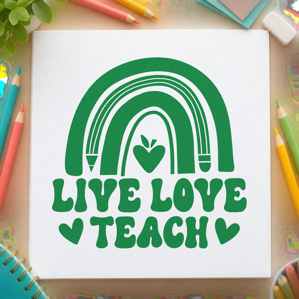 Live Love Teach Rainbow craft stamp imprint in green ink on a handmade project, one idea being art plan pages.