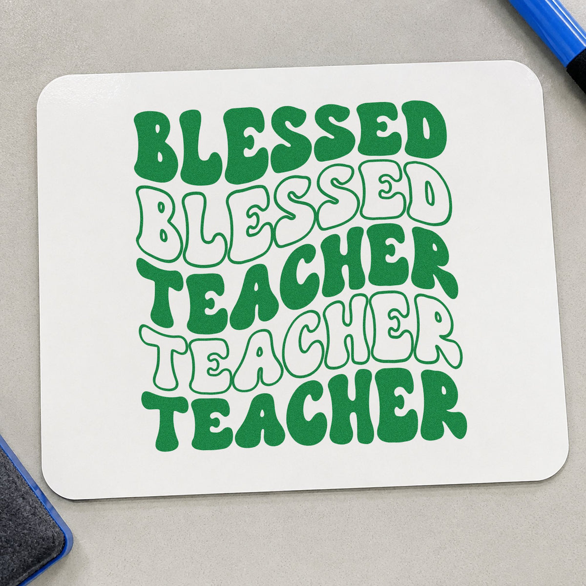 Blessed Teacher Repeated Rows craft stamp imprint in green ink on a handmade project, one idea being devotion plan pages.