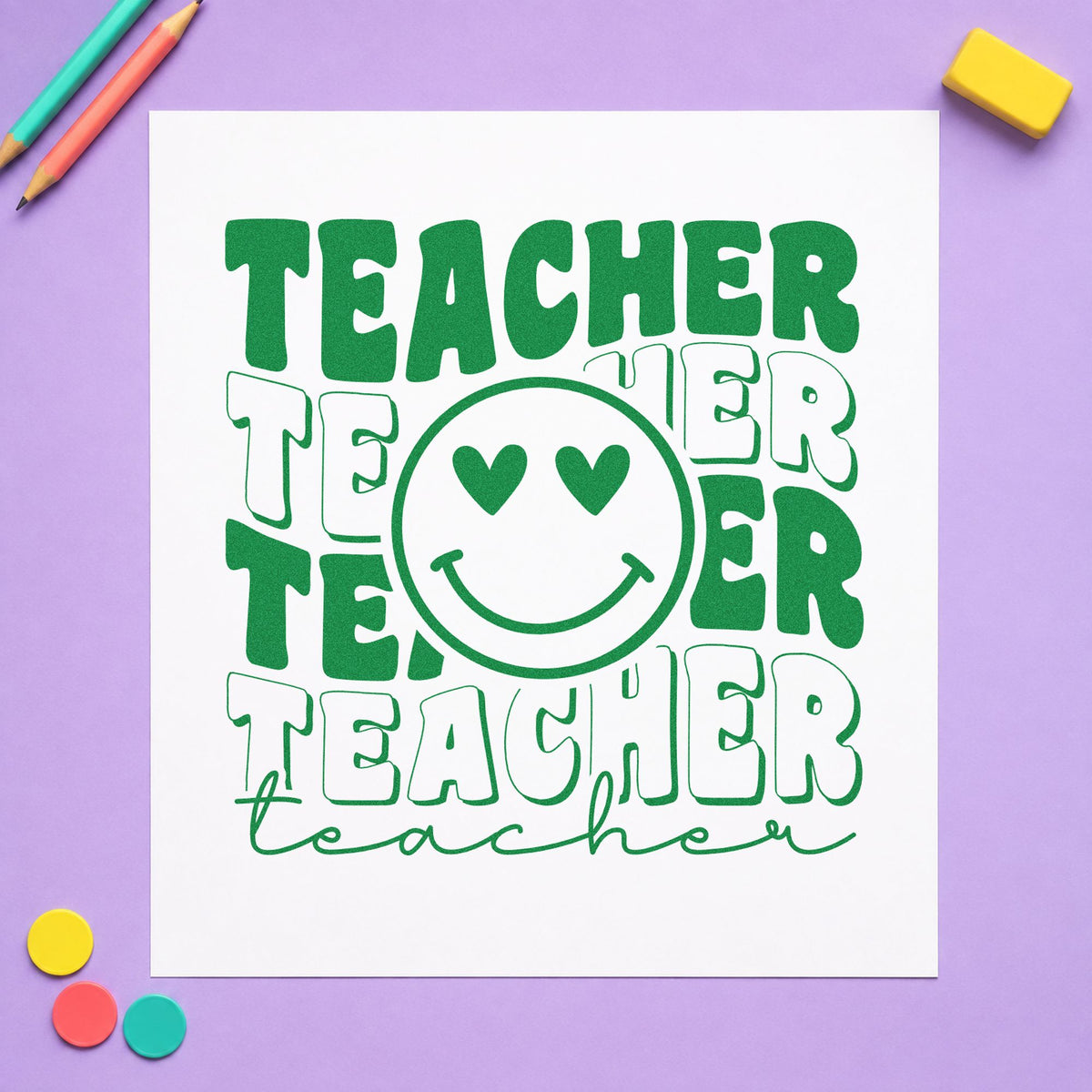 Teacher Repeated Heart Eyed Smile craft stamp imprint in green ink on a handmade project, one idea being check in pages.