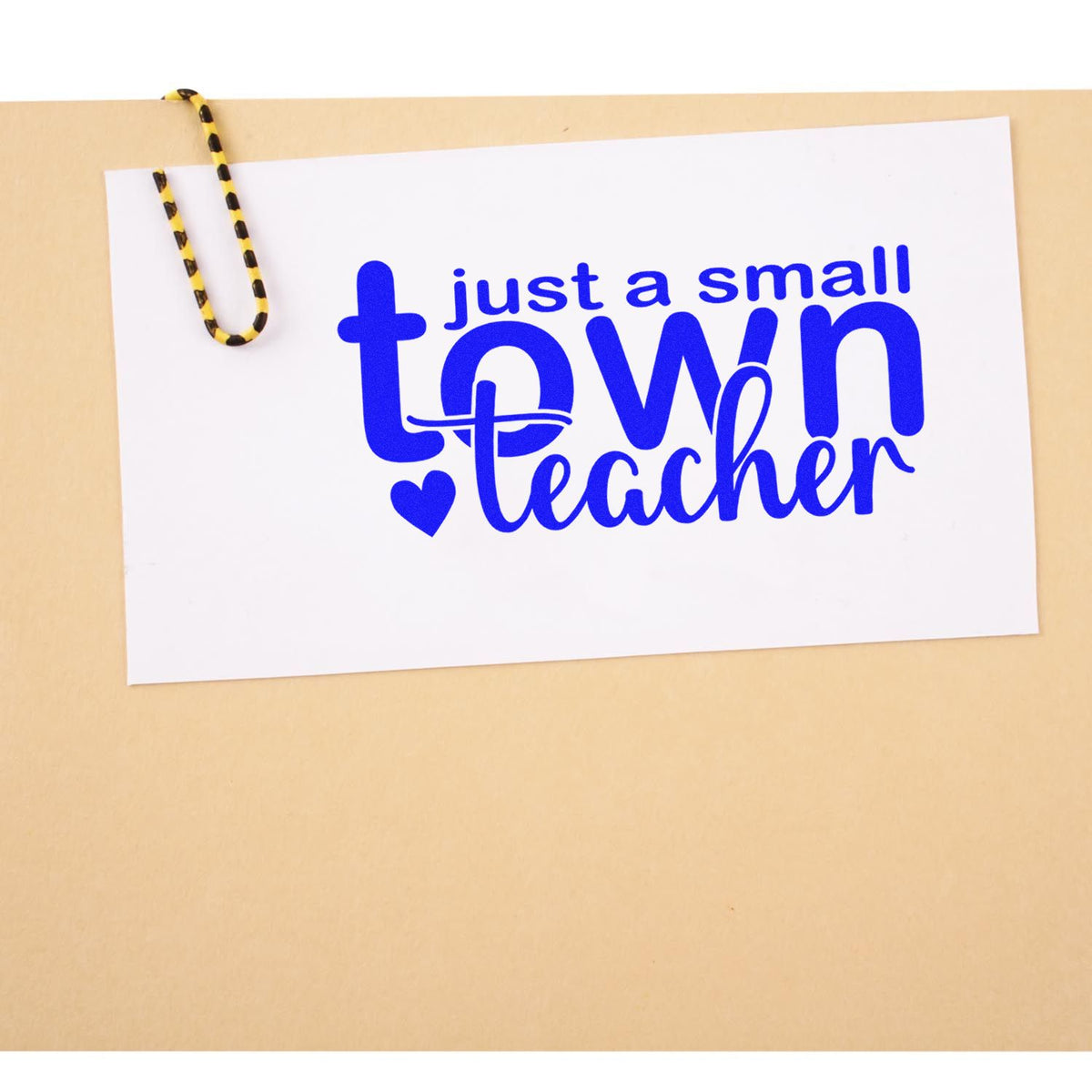 Small Town Teacher rubber stamp shown in blue ink, stamped for projects such as village fete tags.