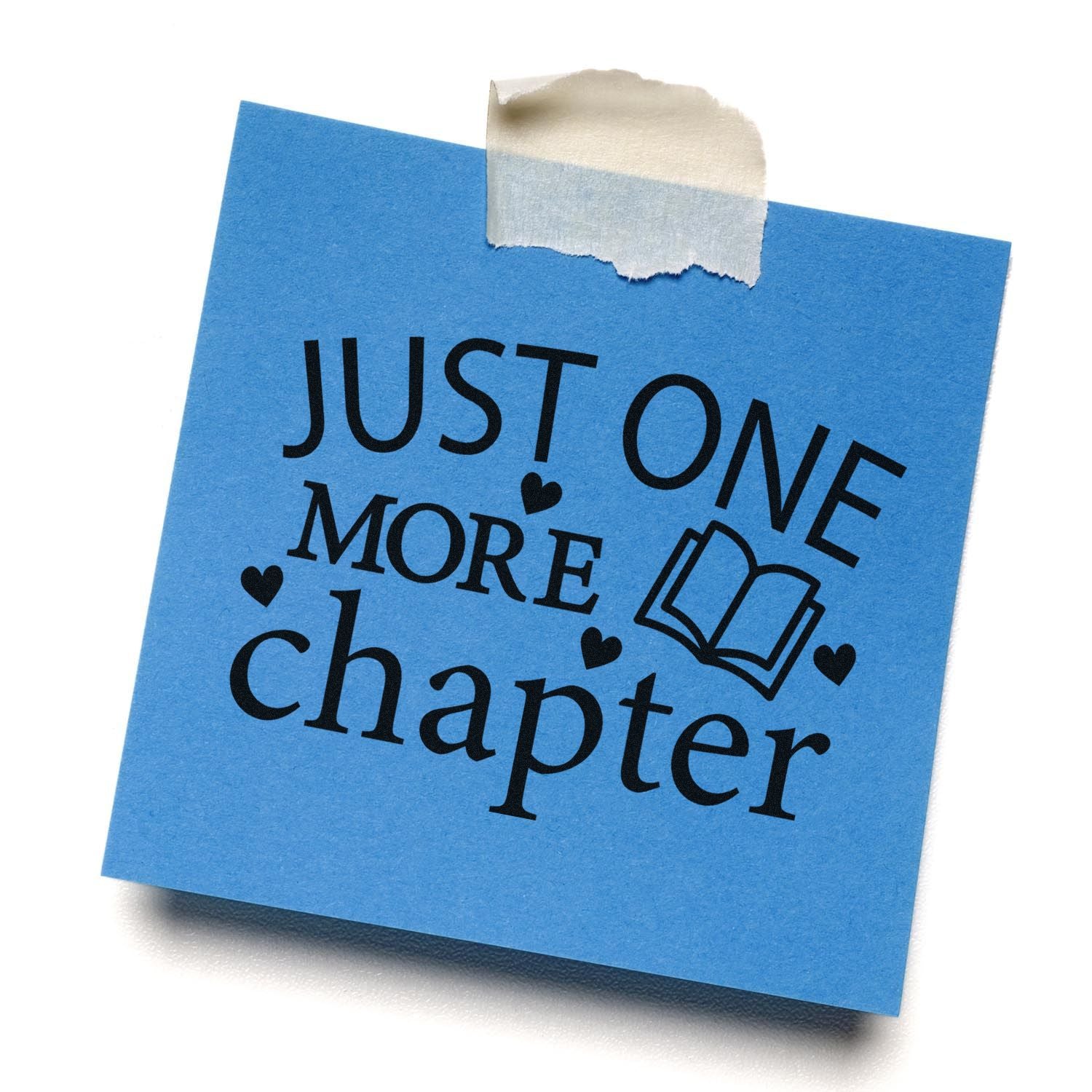 Just One More Chapter rubber stamp design on blue note, perfect for book lovers, journaling, and reading-themed crafts.
