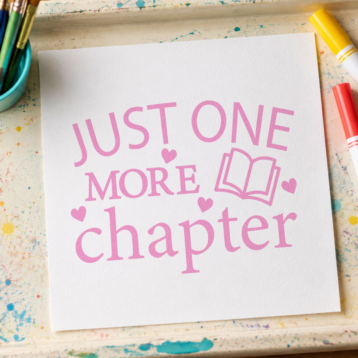 Just One More Chapter Book craft stamp in purple ink on cardstock, an easy option for reading set tags.