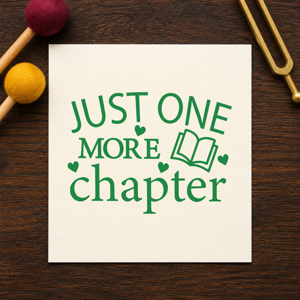 Just One More Chapter Book craft stamp imprint in green ink on a handmade project, one idea being framed quiet chair.